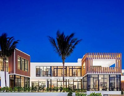 Palm Beach residence at dusk from the waterway